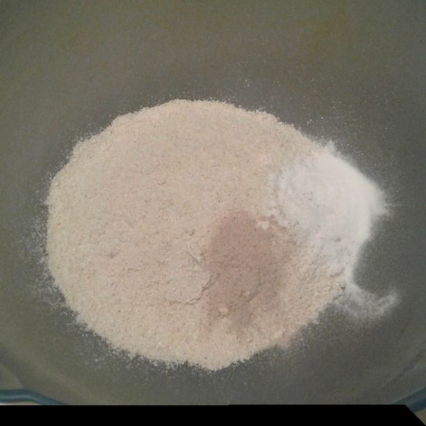 Flour, psyllium husk powder, baking powder in a mixing bowl